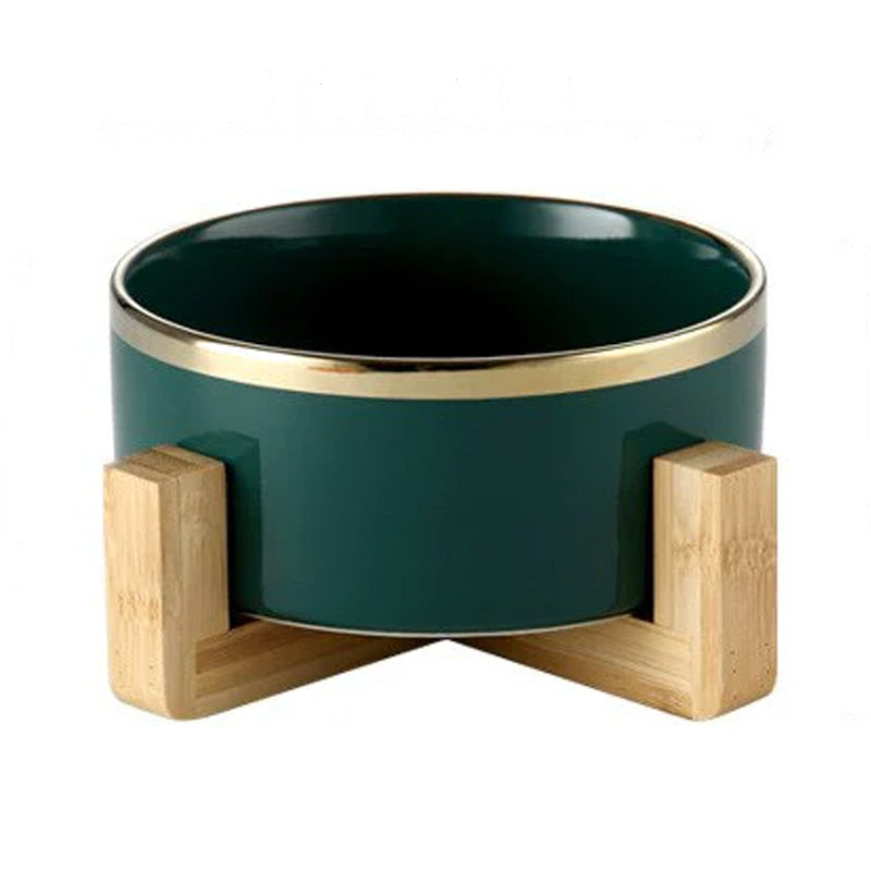 Elegant ceramic food bowl with gold rim and stable wooden base