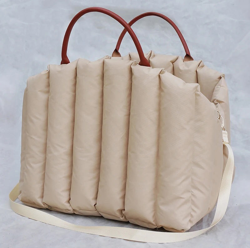 2-in-1 padded dog bag that easily converts into a comfortable car bed
