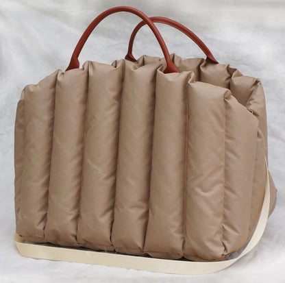 2-in-1 padded dog bag that easily converts into a comfortable car bed